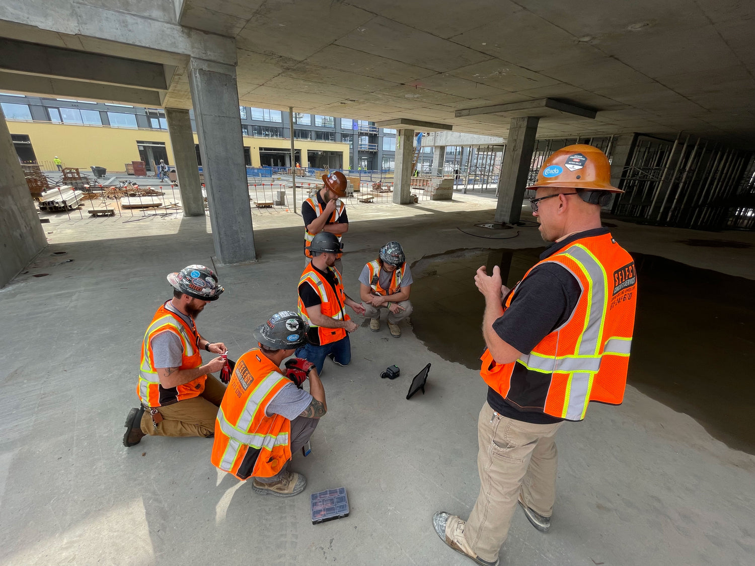 Select Concrete Services Employees working together on a project